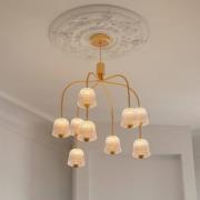 Nuura LED-Kronleuchter Asteea 9, Ø 66 cm, messingfarben/klar